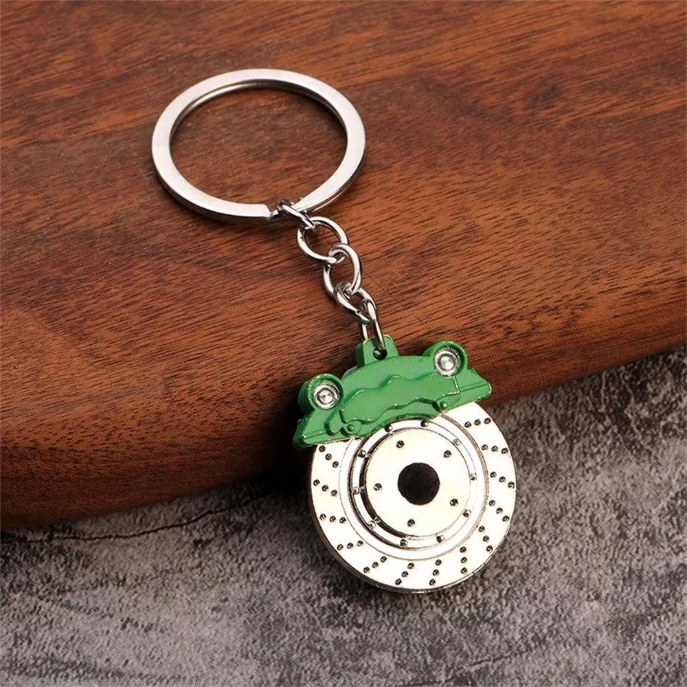 Performance brake disc keychain shown from the side