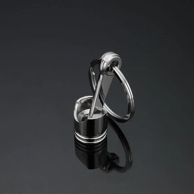 JDM piston keychain — zinc alloy piston and rod replica with split ring