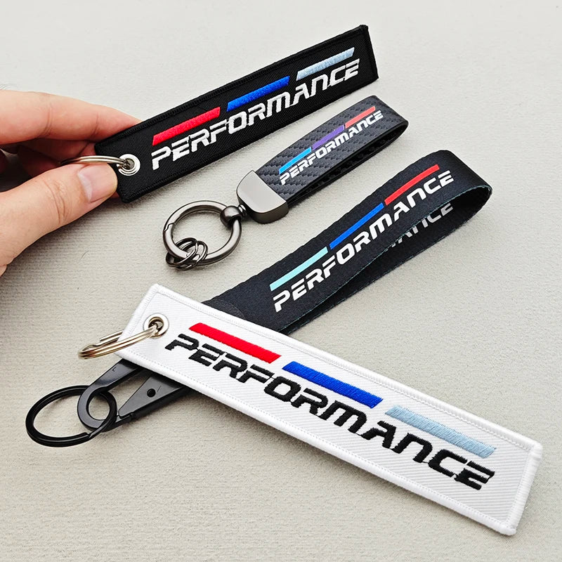 Performance car lanyard close-up — woven nylon detail