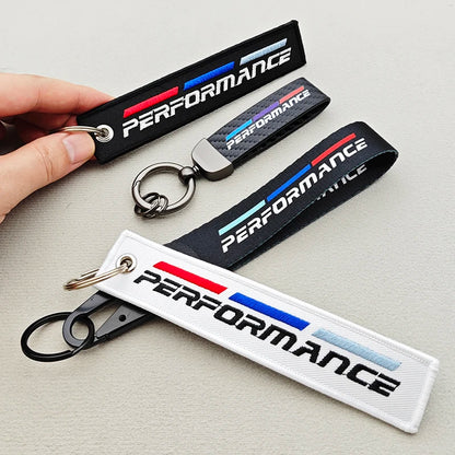 Performance car lanyard close-up — woven nylon detail