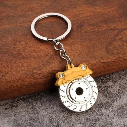 JDM brake rotor keychain top view — slotted rotor face