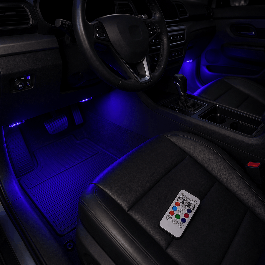 Car footwell at night lit purple by wireless RGB glow pods